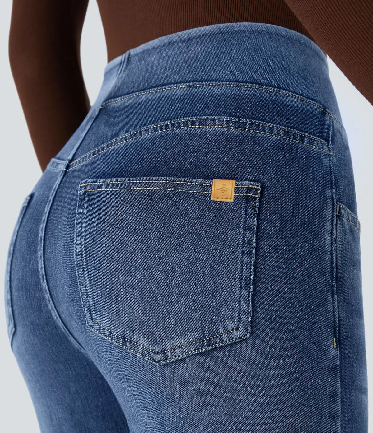 Jean Bootcut Cintura Alta con Bolsillos