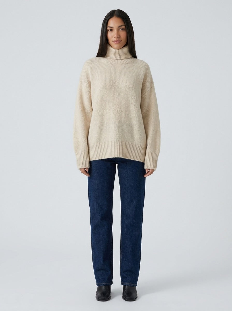 Suéter Línea de cuello alto beige - frente